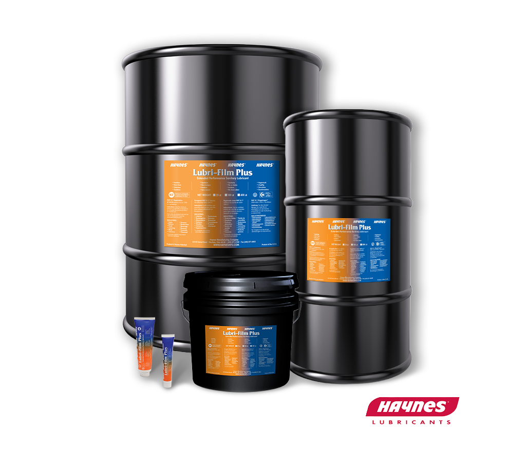 Set of Haynes Lubri-Film Plus drums, pail and tubes and bottles on a white background with Haynes logo
